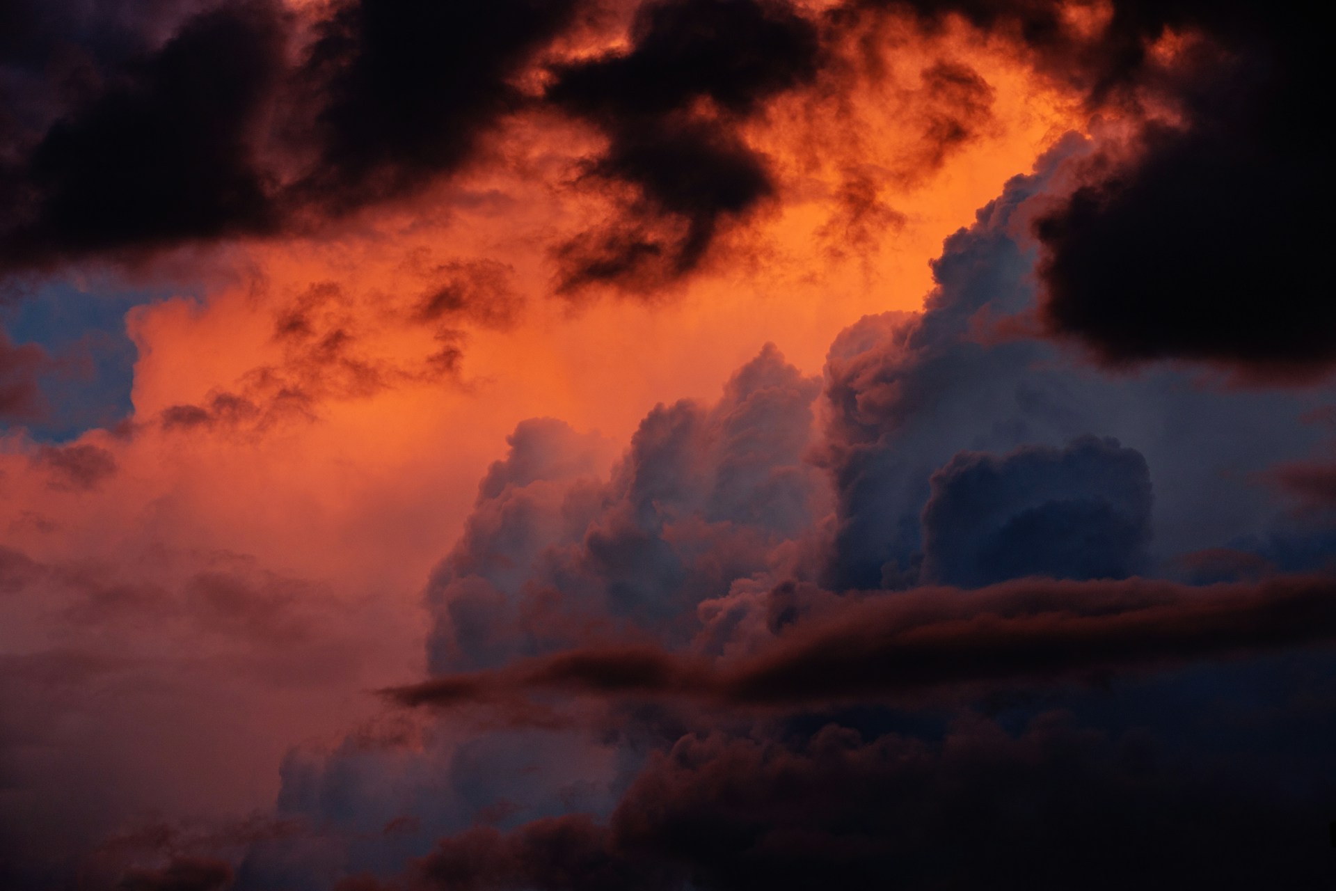 Decorative cloud graphic in warm light.